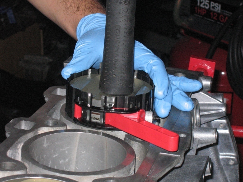 Installing piston into bore