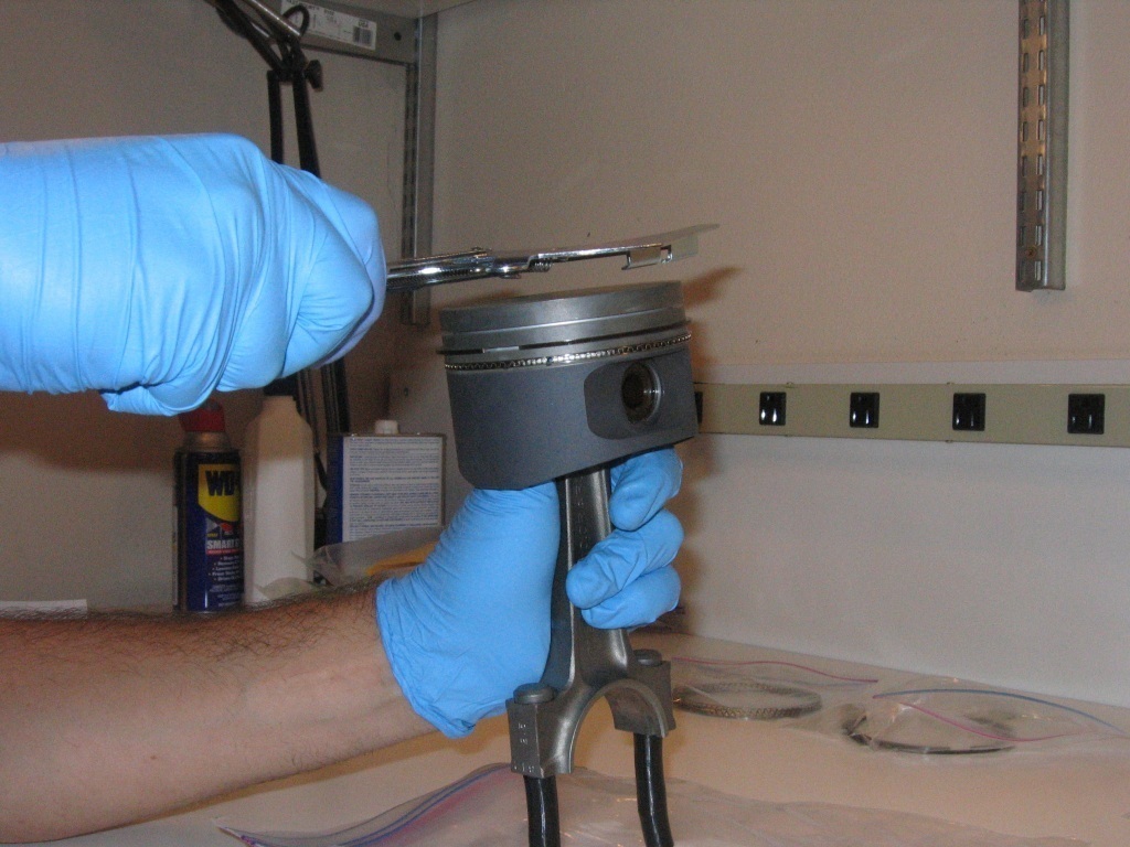 Installing first compression ring